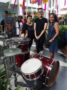 SP President and Co-founder Marilen Morris poses with Owens’ family. This nice family was deeply moved by the Lee Symphonic Band performance at Ayala SERIN Mall's in Tagaytay City and decided to donate a drum set for SP children.