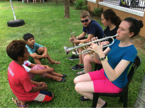 Kids watching trumpet